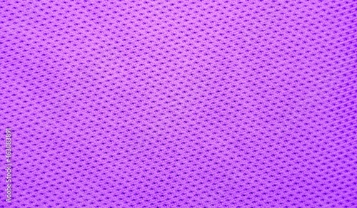 Purple background, textured violet fabric close-up, space for text.
