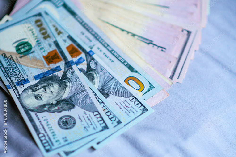 Money stocked together, mixed bills. Money stocked together, mixed bills.