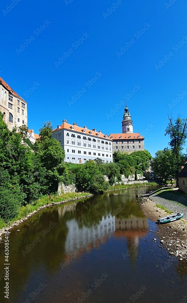 A view of the Cesky Krumlov castle with reflection in Vltava river in the town of Cesky Krumlov, Czech Republic.