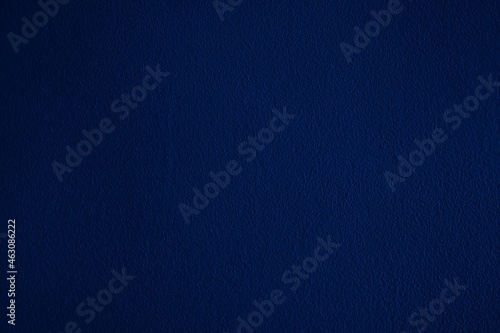 Dark blue background with decorative stucco design.  Abstract navy blue and indigo blank template for ad, card, invitation, poster, wallpaper, website, etc. photo
