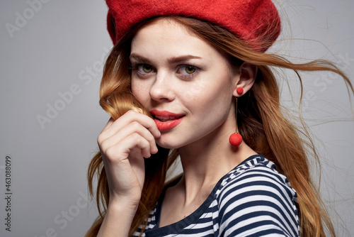 pretty woman wearing a red hat makeup France Europe fashion posing summer