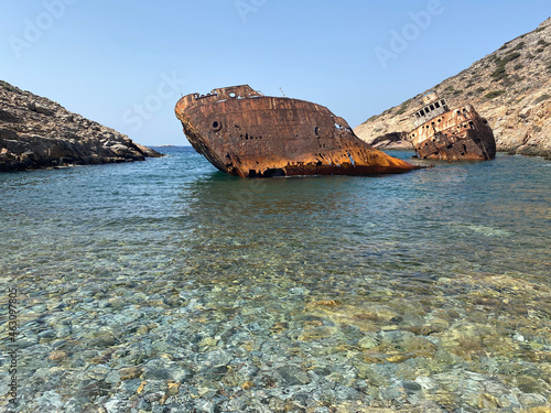 Shipwreck Olympia boat in Amorgos island during summer holidays, at the coastal rocky area, Cyclades, Greece. Travel background