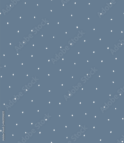 Falling snow, small polka dots, simple childish winter seamless pattern, white on blue background. Hand drawn vector illustration. Design concept for kids textile, fashion print, wallpaper, packaging.