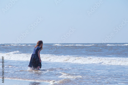 child girl, playing on the beach, british beach, british, summer, british summer, norfolk beach, cromer, child, playing, beach