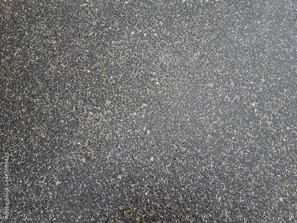 Gray wet asphalt after rain, top view Gray wet asphalt after rain, top view