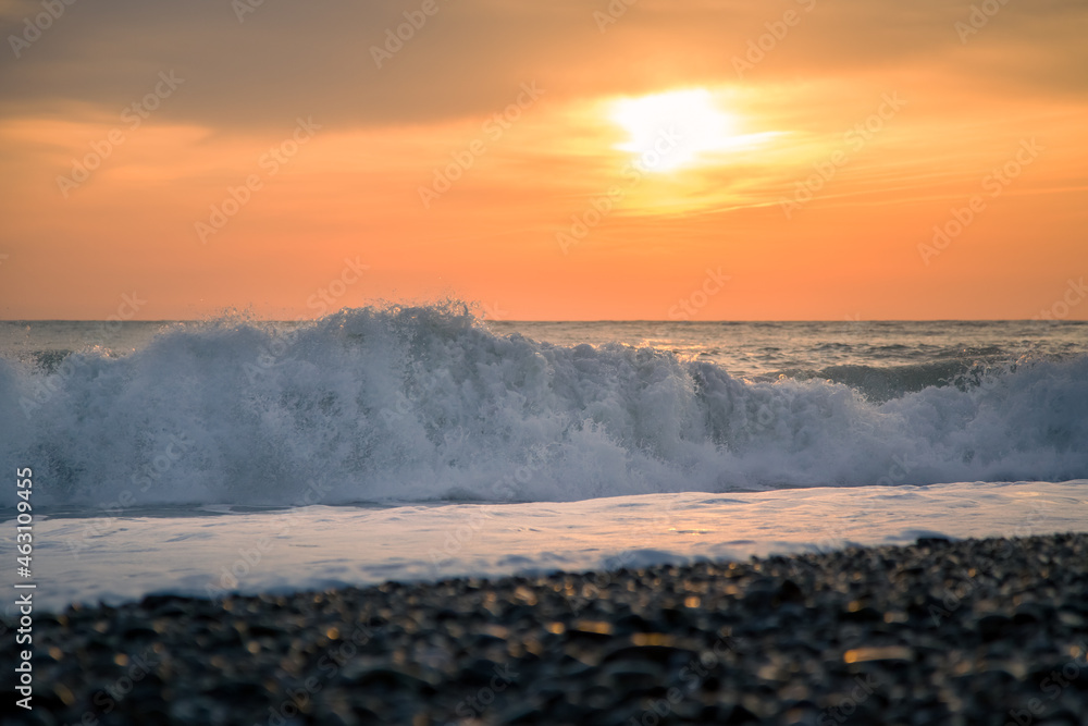 big waves and sunset on the shore