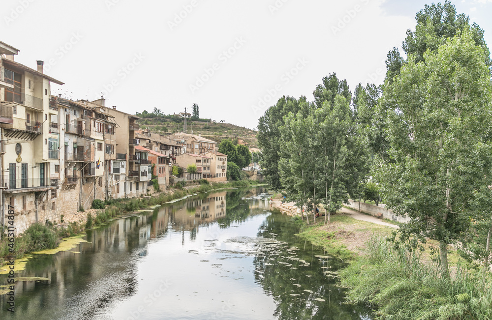 Beautiful views of the towns of Teruel with the reflection of their houses in the river Beautiful views of the towns of Teruel with the reflection of their houses in the river