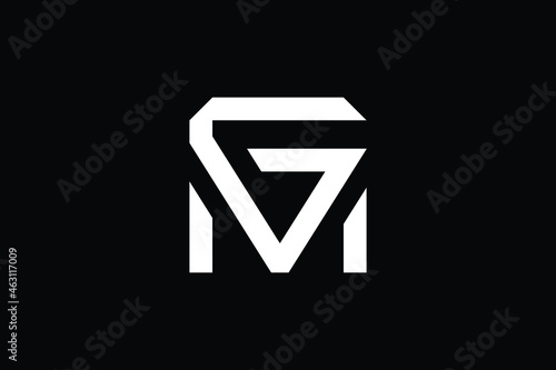 MG logo letter design on luxury background. GM logo monogram initials letter concept. MG icon logo design. GM elegant and Professional letter icon design on black background. M G GM MG