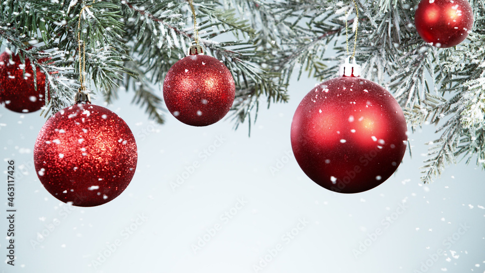 Christmas balls hanging on snowy fir tree Christmas balls hanging on snowy fir tree