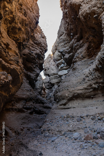 Hiking in a slot canyon of Lake Mead