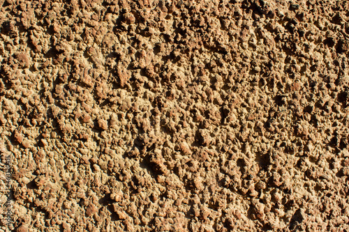 Photo texture of brown colored concrete wall stucco.