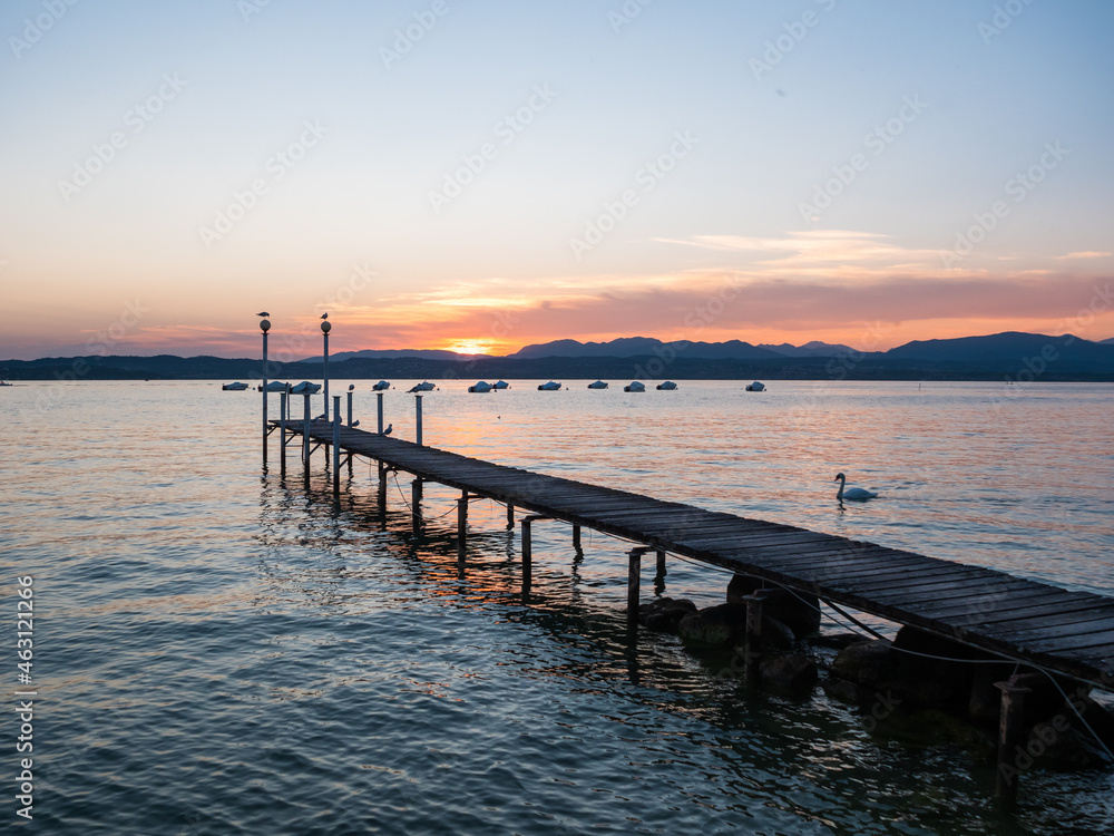 Lake Garda Jetty or Pier at Sunset in the Evening on the Sirmione Peninsula