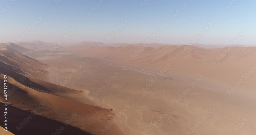 pan to the left aerial shot from the greatest sand dunes in the Dasht-e Lut desert, aerial shot from the great sand dunes in the world pan to the left aerial shot from the greatest sand dunes in the Dasht-e Lut desert, aerial shot from the great sand dunes in the world