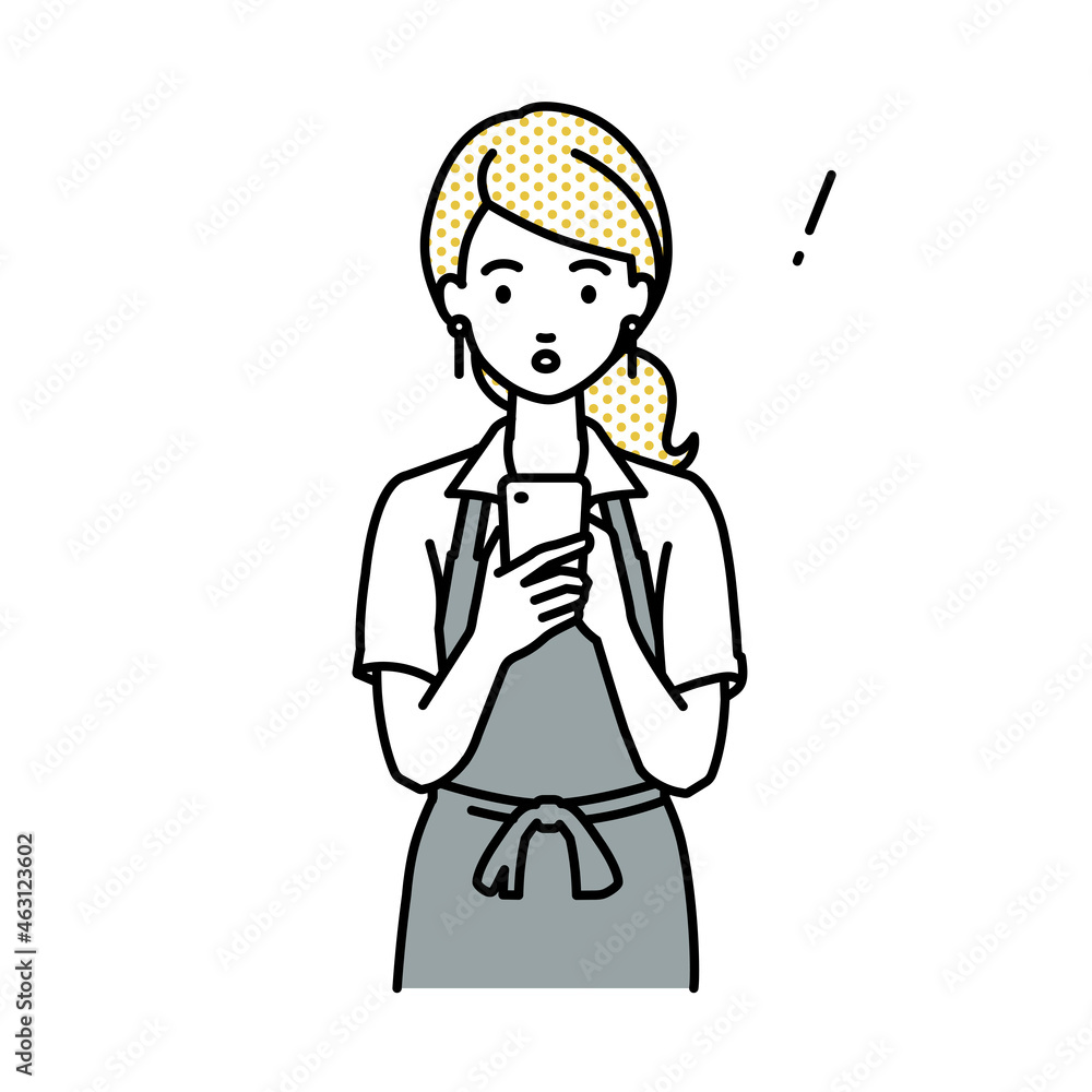 立ってスマートフォンを操作して何かに気づいて驚いたカフェ店員の女性 立ってスマートフォンを操作して何かに気づいて驚いたカフェ店員の女性