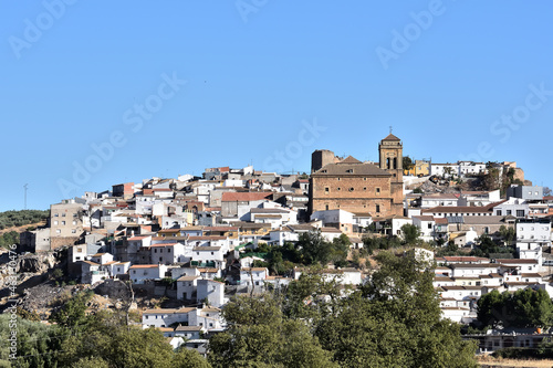 View of the church Nuestra Señora de los Remedios (16th century) in the Granada town of Iznalloz (Spain)