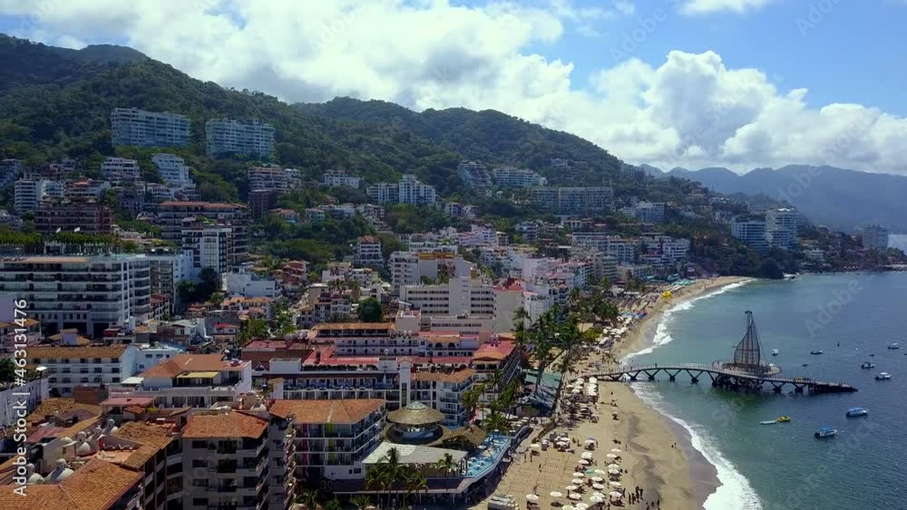 Beautiful aerial view of the resorts in Puerto Vallarta beach under cloudy sky Beautiful aerial view of the resorts in Puerto Vallarta beach under cloudy sky