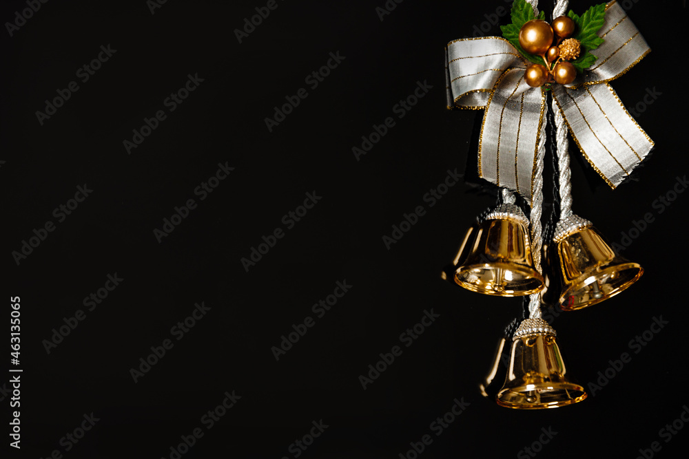Festive New year Christmas bell on black background