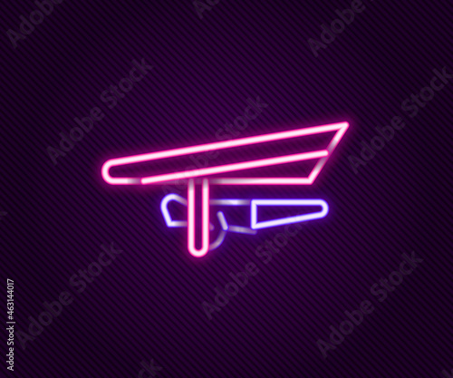 Glowing neon line Hang glider icon isolated on black background. Extreme sport. Colorful outline concept. Vector