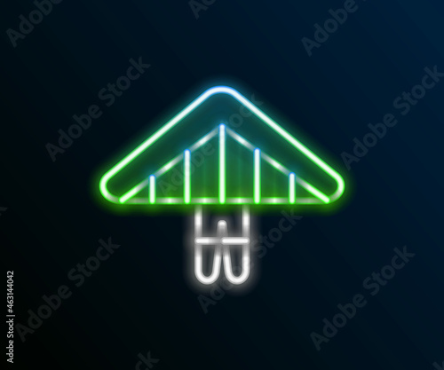 Glowing neon line Hang glider icon isolated on black background. Extreme sport. Colorful outline concept. Vector