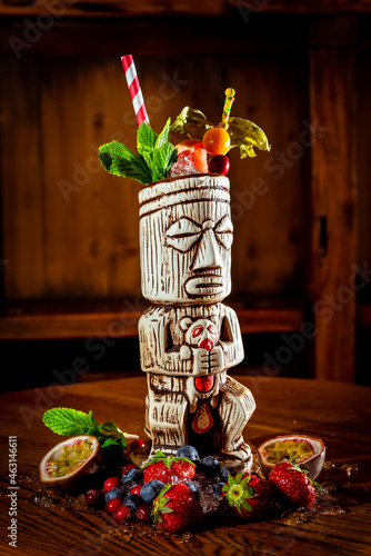 Mai Tai alcoholic cocktail on wooden table 
