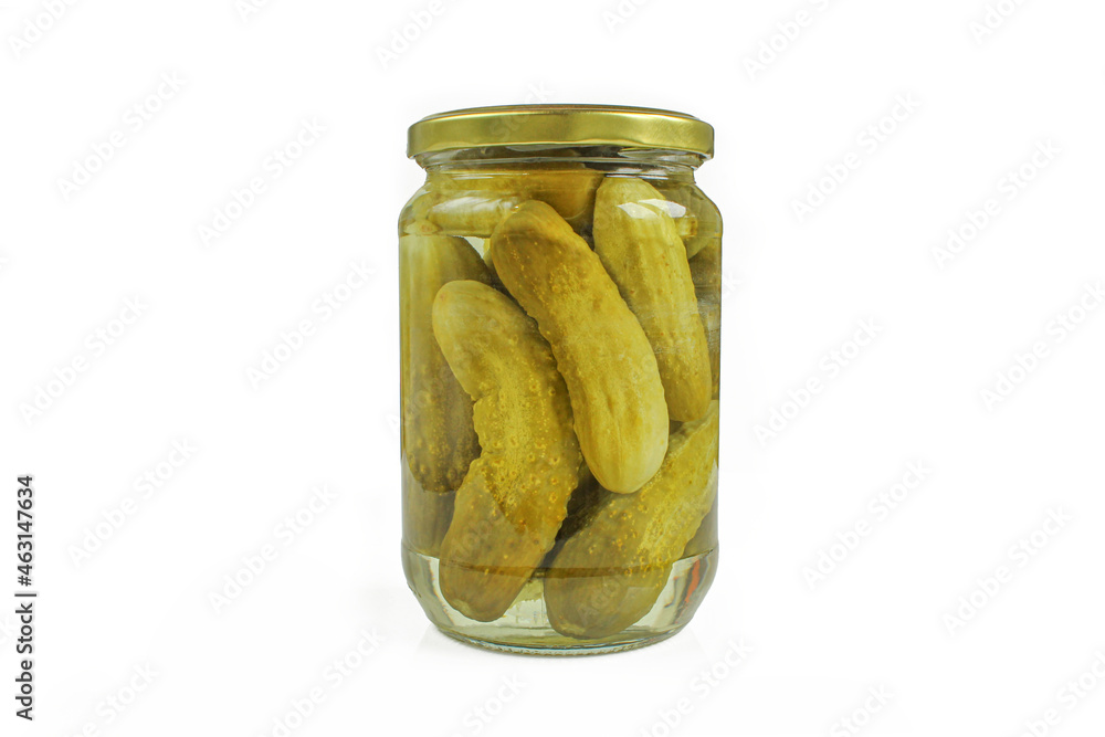 Jar of pickles isolated on white background. Green cucumbers marinated Jar of pickles isolated on white background. Green cucumbers marinated