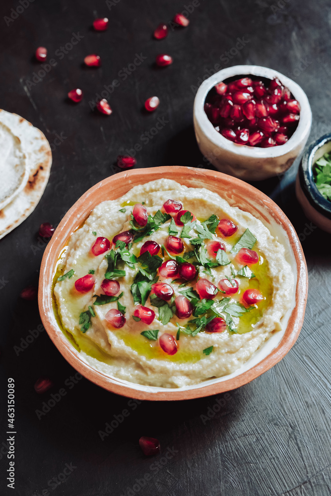 Mutabal, parsley , pomegranate and pita bread Mutabal, parsley , pomegranate and pita bread