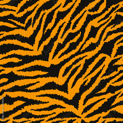 Seamless tiger fur pattern. Tigers skin print in hand drawn doodle style. Abstract animal background design. Vector illustration.