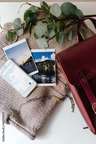 Accessories for travelling concept arranged on table photo