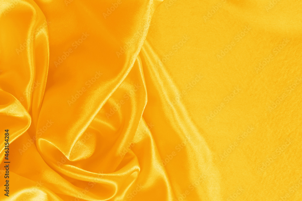 Obraz premium Elegant bright satin with waves. Fabric backdrop, view from above. Luxury cloth texture. Prefect as an abstract background with copy space, close-up.