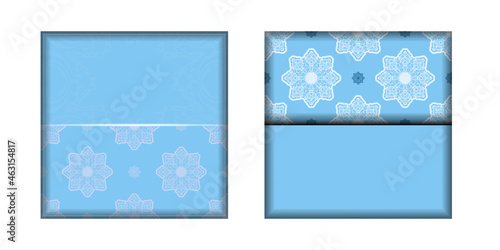 Greeting card template in blue color with luxurious white pattern prepared for printing.