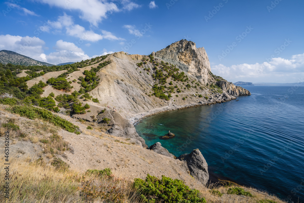 Summer Crimean landscape. Golitsyn trail at rocky Black Sea coast at sunny day, Novyi Svit, Sudak Municipality, Crimea