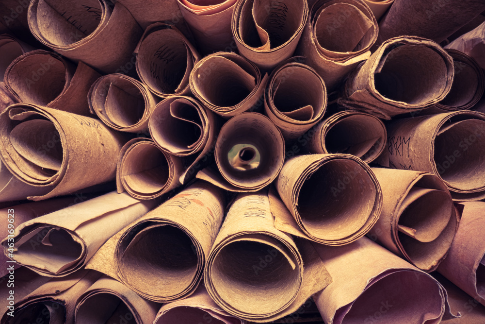 Old scroll library. Stack of ancient scrolls. Old scroll library. Stack of ancient scrolls.