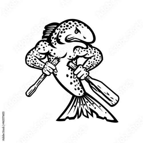 Mascot cartoon illustration of brown trout, Salmo trutta or salmon breaking an oar or paddle front view on isolated background in black and white retro style.