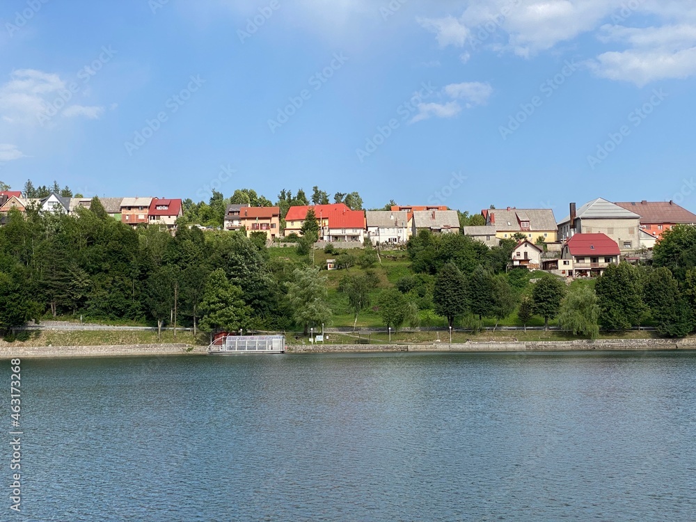 The picturesque mountain village of Fuzine above the artificial accumulation lake Bajer - Gorski kotar, Croatia (Slikovito goransko naselje Fužine nad umjetnim akumulacijskim jezerom Bajer - Hrvatska)