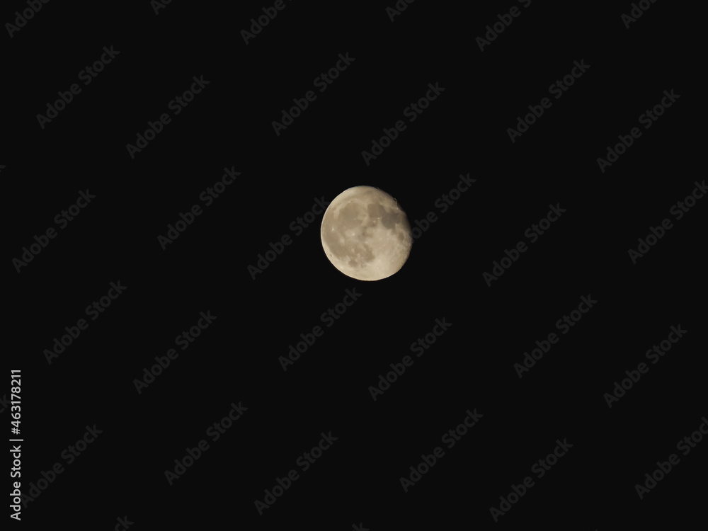 Yellow moon in the dark sky. Yellow moon in the dark sky.
