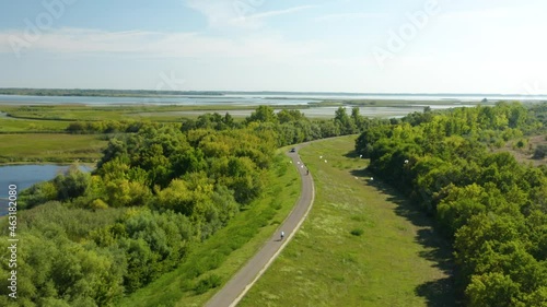Cycling on a beautiful road in a European landscape.