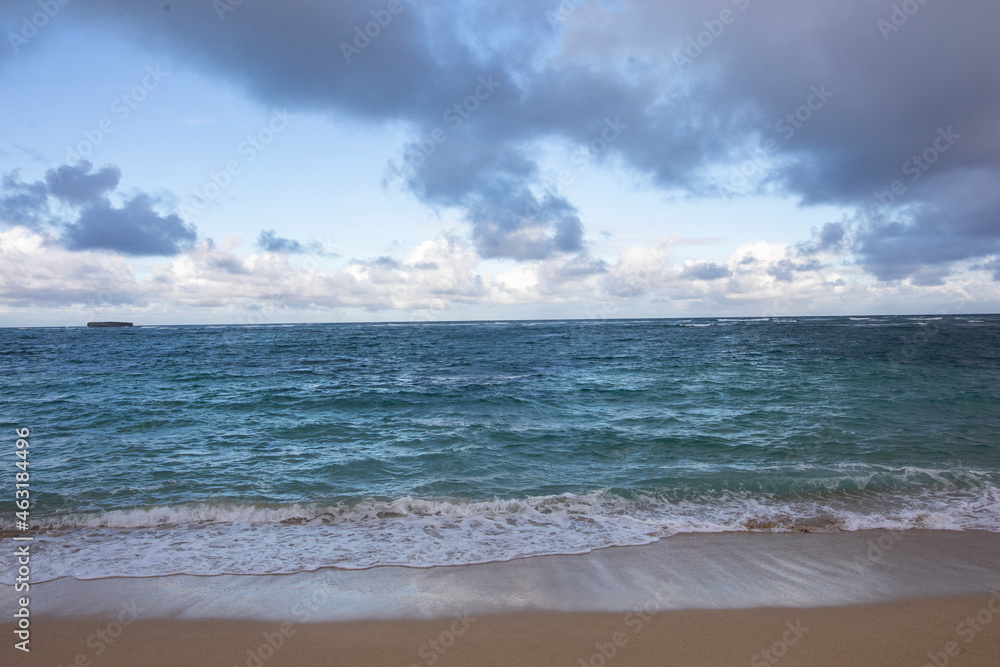 ocean waves on a sandy beach