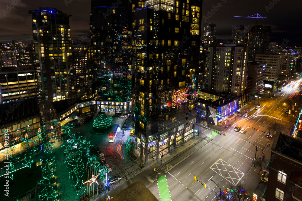 Beautiful street illuminations in the city downtown at night. Vancouver in Christmas time. View from above