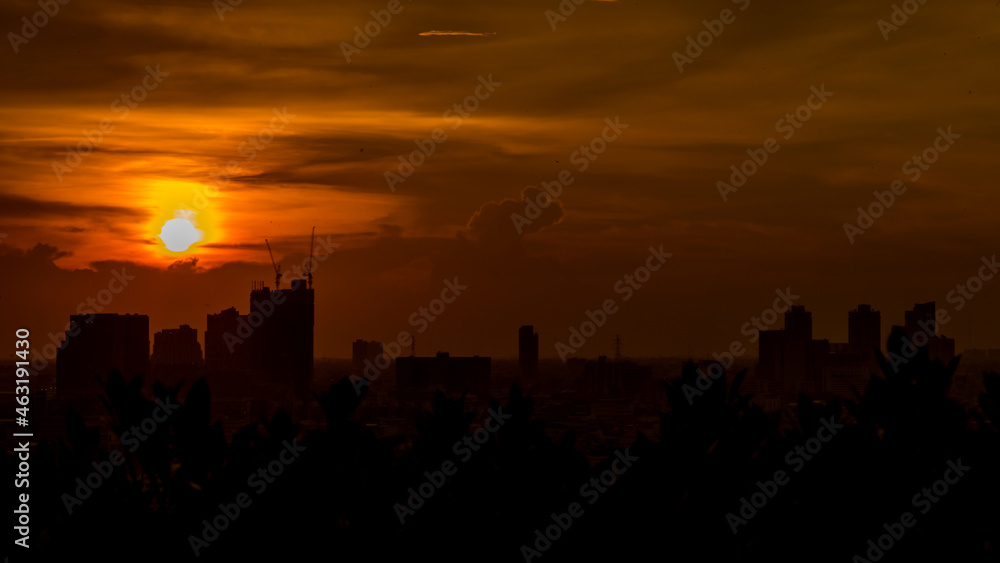 The high angle background of the city view with the secret light of the evening, blurring of night lights, showing the distribution of condominiums, dense homes in the capital community The high angle background of the city view with the secret light of the evening, blurring of night lights, showing the distribution of condominiums, dense homes in the capital community