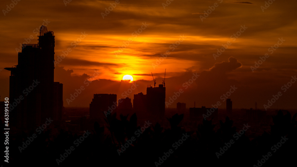 The high angle background of the city view with the secret light of the evening, blurring of night lights, showing the distribution of condominiums, dense homes in the capital community The high angle background of the city view with the secret light of the evening, blurring of night lights, showing the distribution of condominiums, dense homes in the capital community