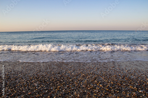 Beautiful seascape with sea waves and sand. Sea waves on the beach.