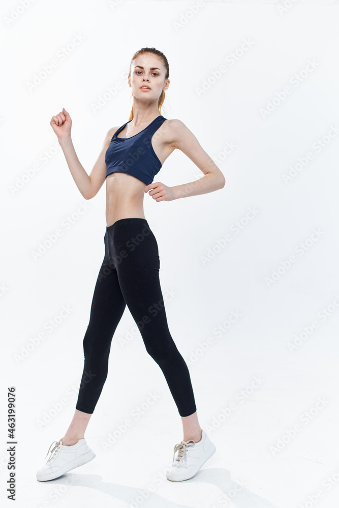 athletic woman workout active sport jumping light background