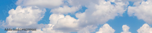 Panorama blue sky background with clouds.
