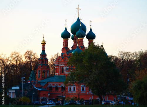 Orthodox church during sunset time background photo