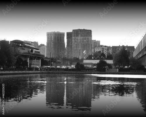 Building reflections in city pond background