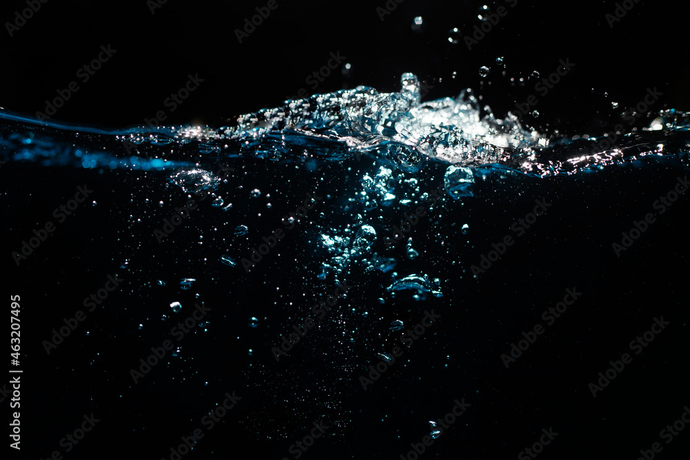 Water Surface with Ripple and Bubbles on Black Background. Water Wave Water Surface with Ripple and Bubbles on Black Background. Water Wave