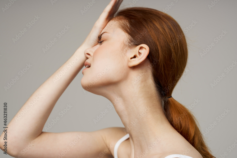 woman in white t-shirt headache health problems stress studio treatment woman in white t-shirt headache health problems stress studio treatment