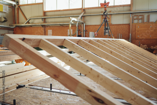Large timber framework for a prefabricated wall in a factory
