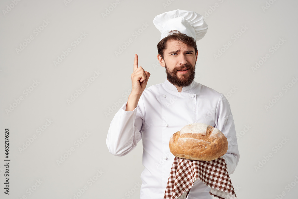 Chef with bread in hand isolated background Chef with bread in hand isolated background
