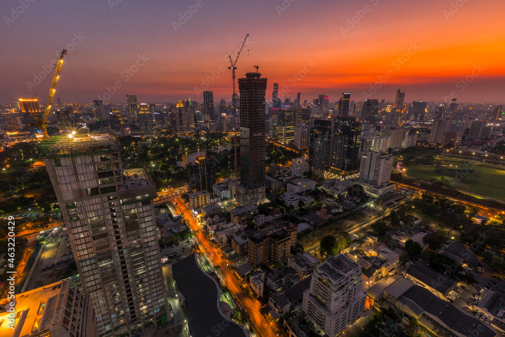 Obraz premium Aerial of Lumpini Park view of highway Road traffic in city at Bangkok thailand. 
